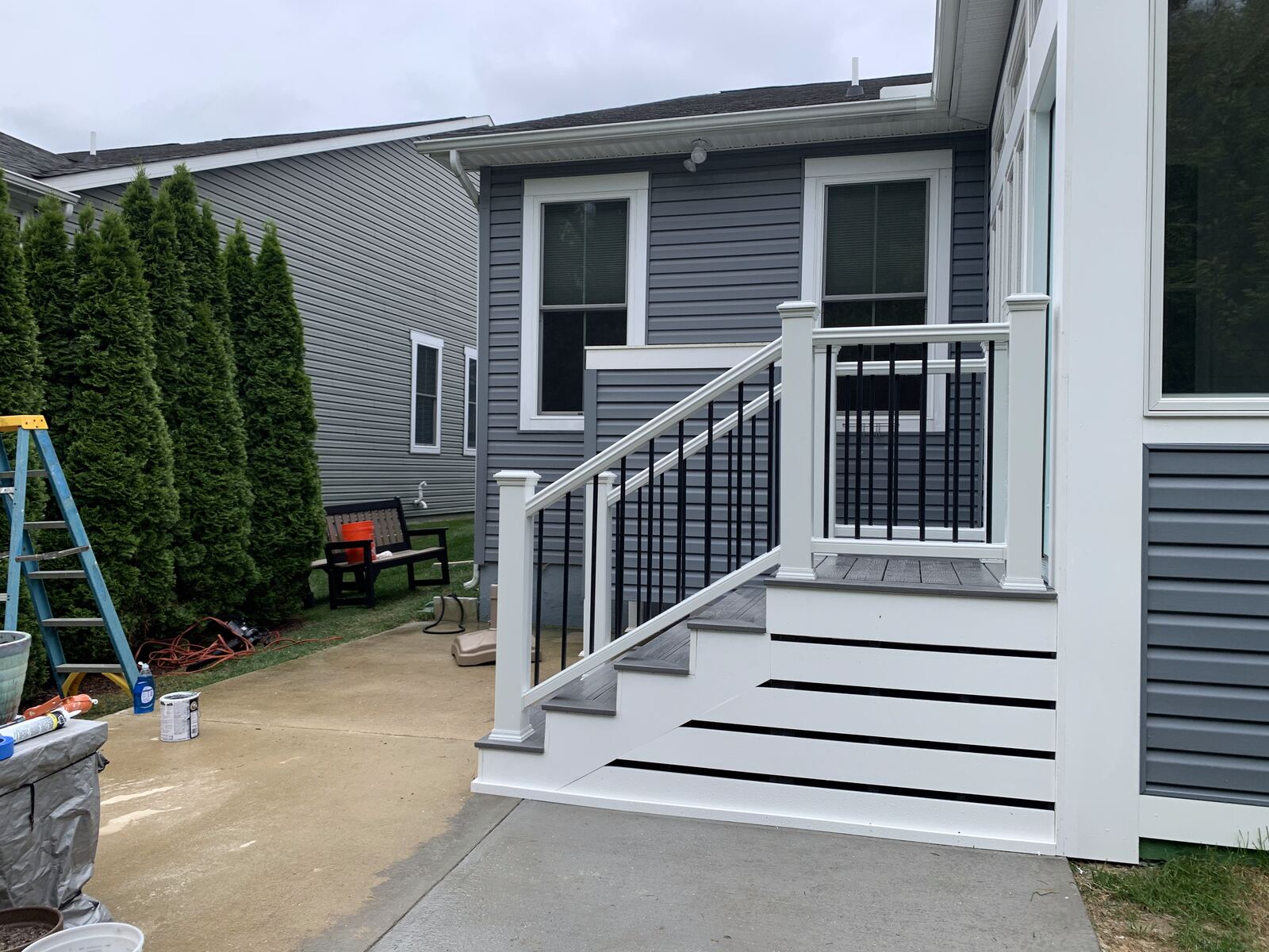 Composite deck and staircase with white railings on a Sussex County, DE home