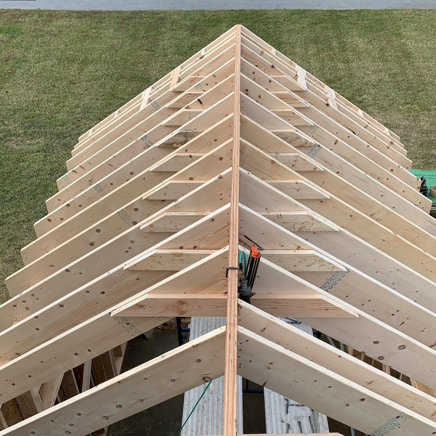 Roof ridge and rafter framing detail on a custom home in Lewes, DE